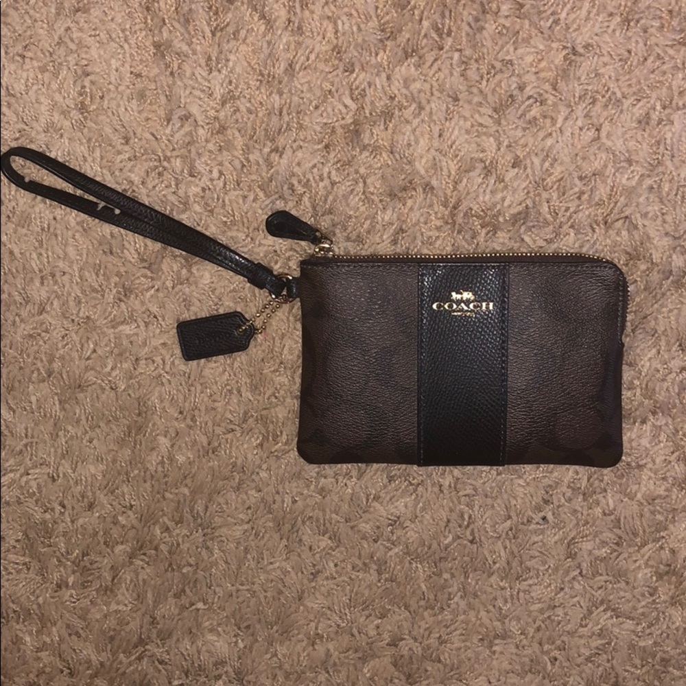 Coach brown logo wristlet. new without tags